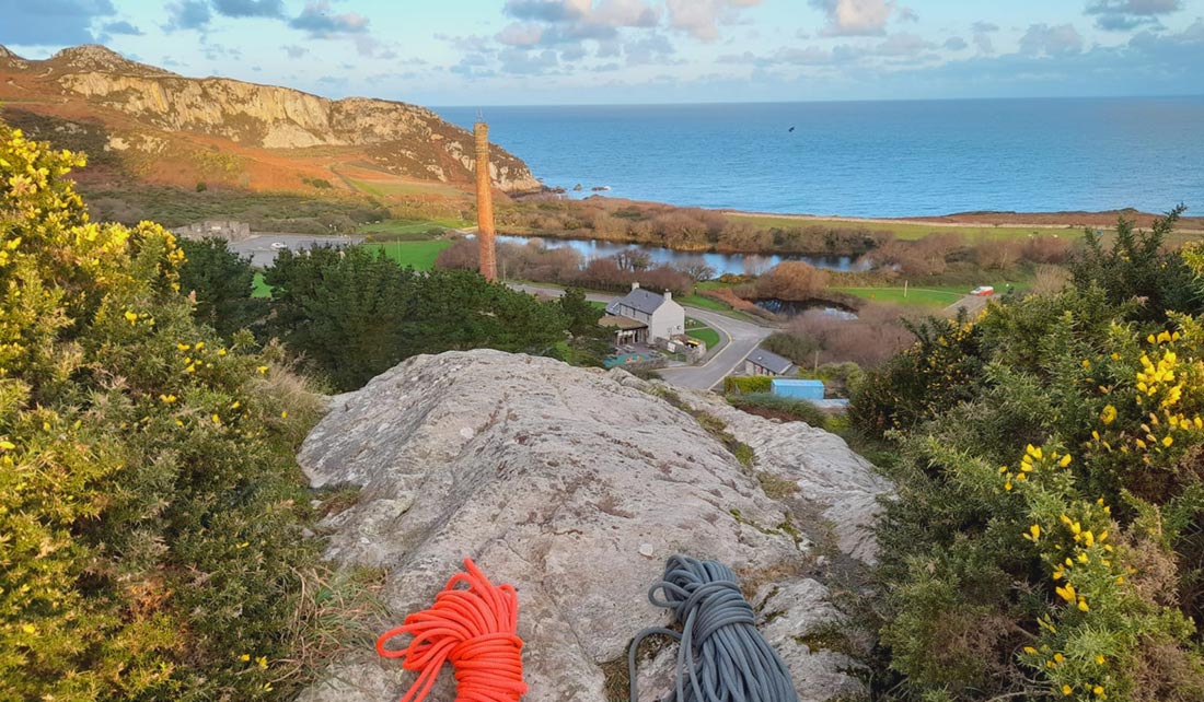 Starting point of Abseiling session, tanding on top of a cliff, looking out to the Irish Sea