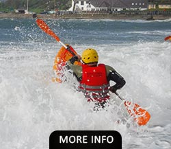 Man paddling a Kayaking into the sea waves